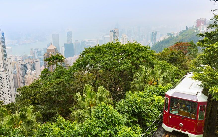 peak-tram-and-central-hong-kong-skyline-hong-kong-2023-11-27-04-52-12-utc-e1720701525776-878x551